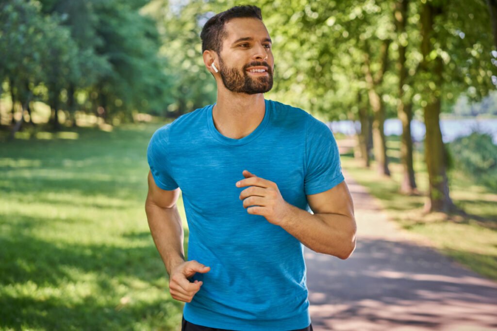 Man going for a run after recovering from liposuction