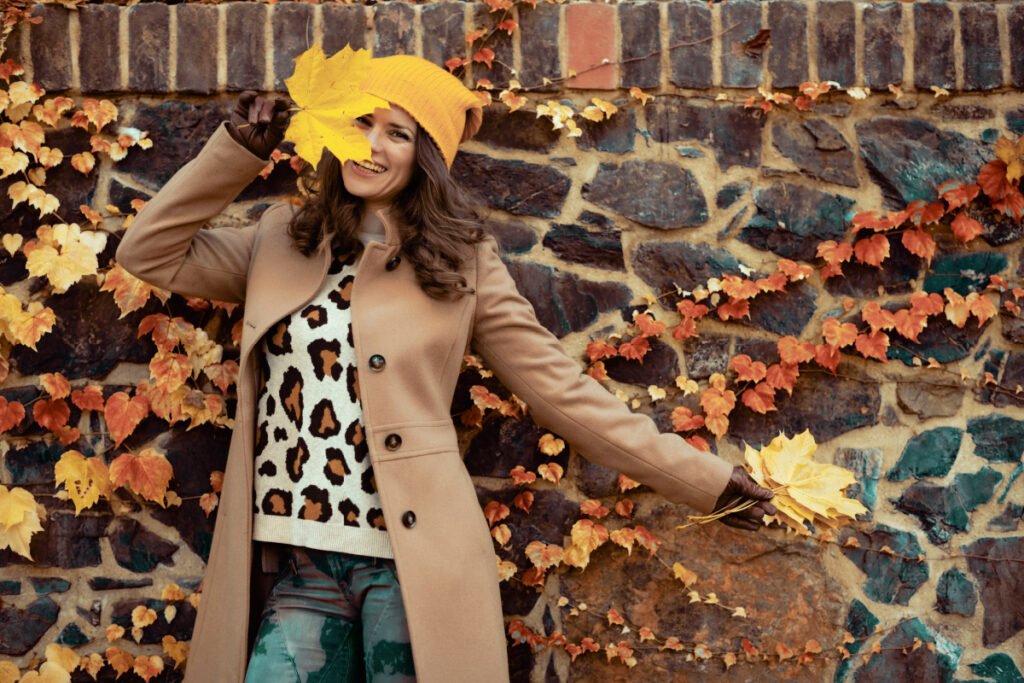 Woman dressed in fall clothing posing for photos in Berks County, PA