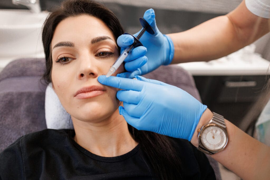 Woman getting a Botox lip flip treatment